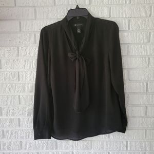 Bow front shirt.